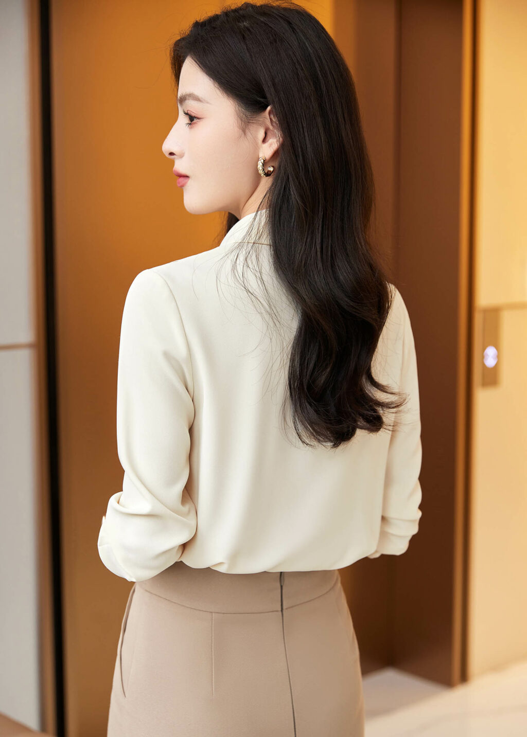 PN3219-9 กระโปรงทำงานผู้หญิงทรงยาวสีเบจแต่งเข็ดขัด