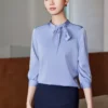 เสื้อเชิ้ตทำงานผู้หญิงสีเทาฟ้าคอปกแต่งจีบแขนห้าส่วน