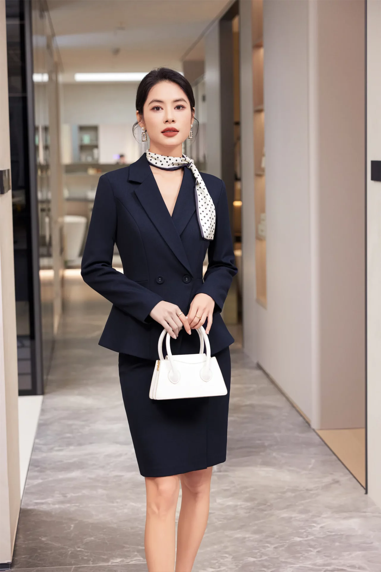 PN5034-5 ชุดสูททำงานผู้หญิงสีเทาปกป้านแต่งกระดุมสองเม็ดแขนยาวมาพร้อมกระโปรง